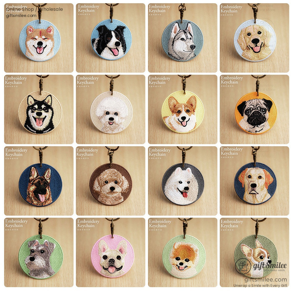 Round embroidered dog keychains with colorful fabric backdrops featuring various dog breeds and detailed stitching