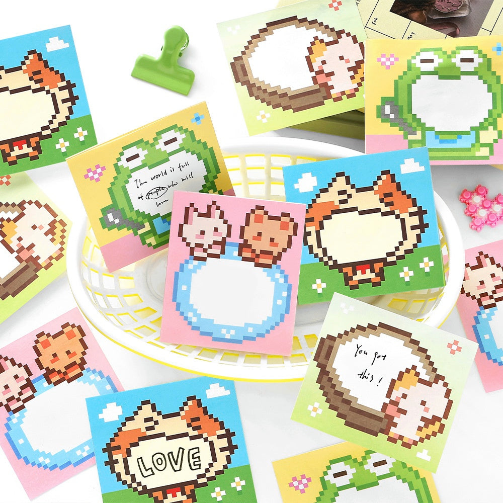Colorful pixel art sticky notes with animal designs including cats and frogs on pastel backgrounds with blank spaces