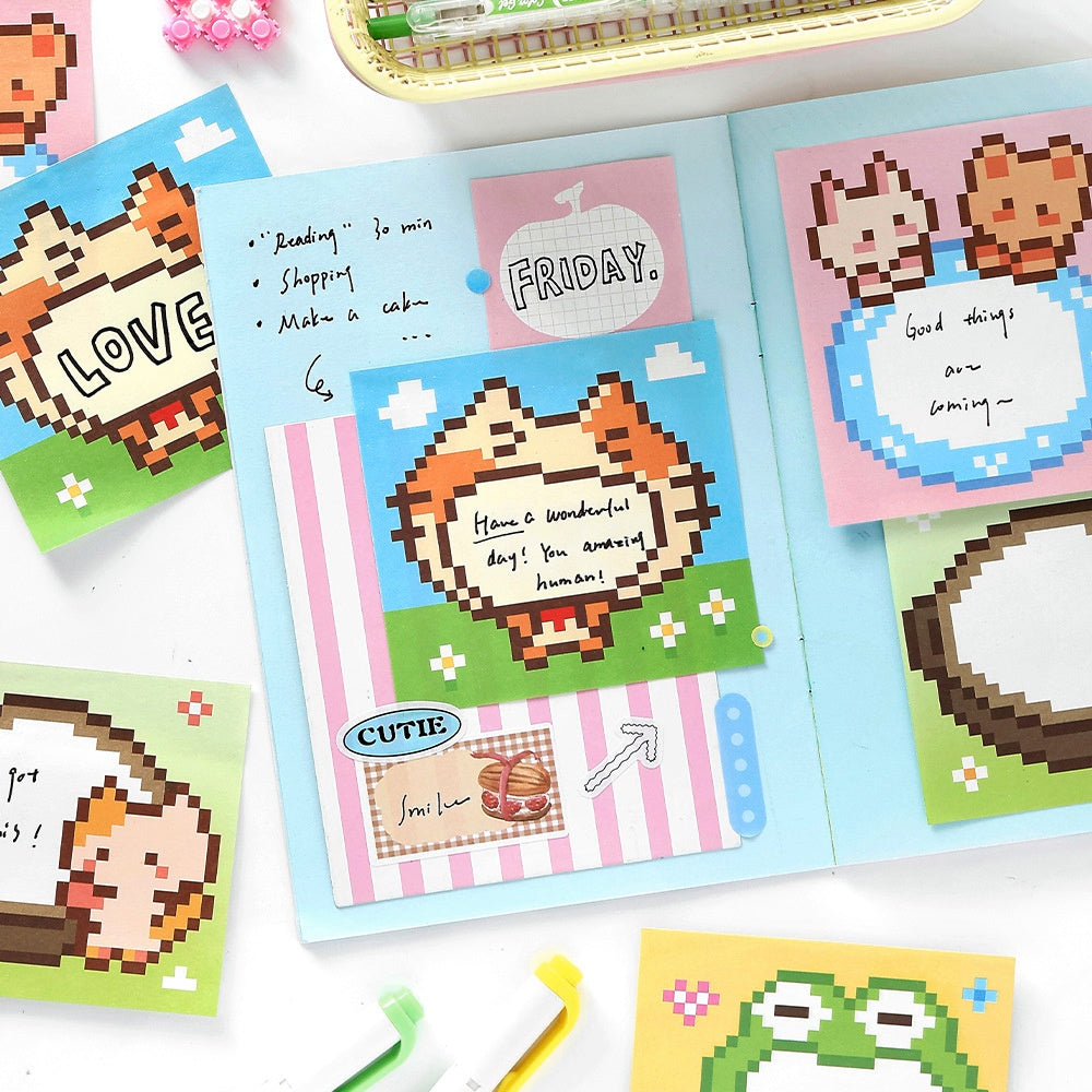Pastel stationery set with pixel art animals colorful notes and motivational messages on blue pink and green backgrounds